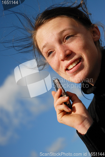 Image of teenager and phone