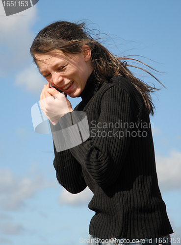 Image of teenager and phone