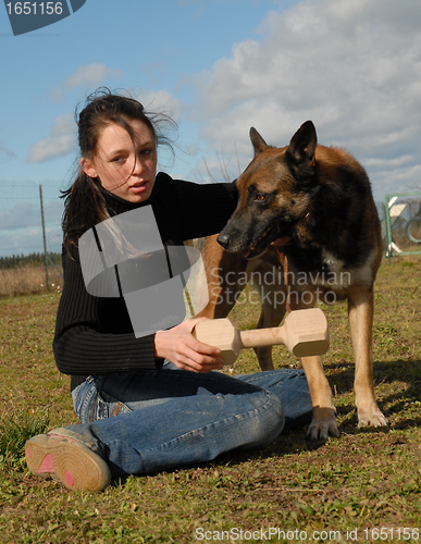 Image of malinois and woman