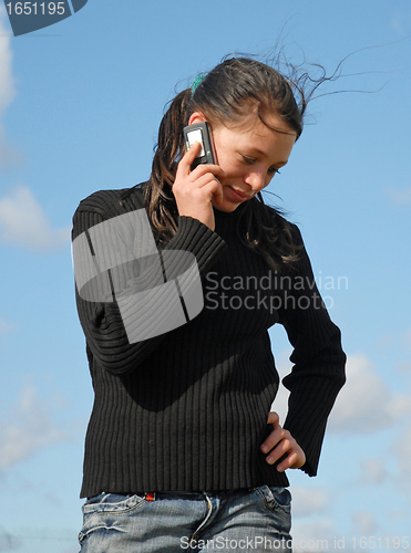 Image of teenager and phone