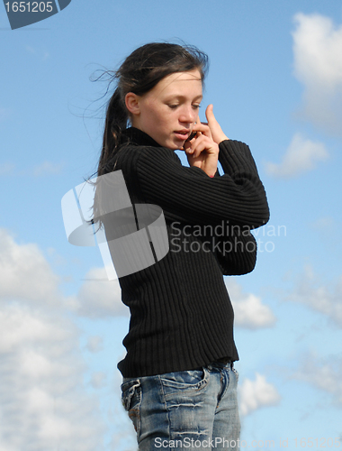 Image of teenager and phone