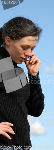 Image of teenager and phone