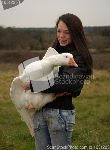 Image of teenager and goose