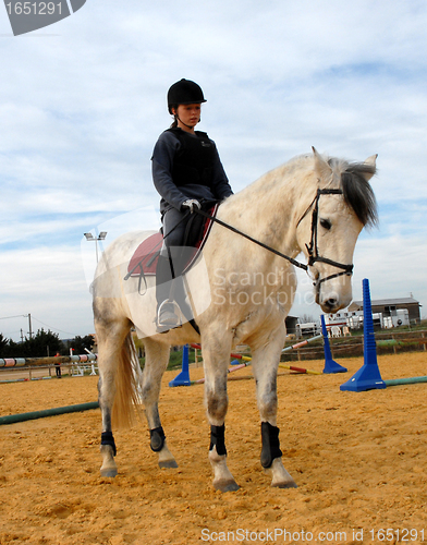 Image of horse and woman in dressage