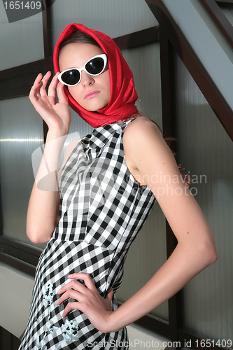 Image of girl in plaid dress