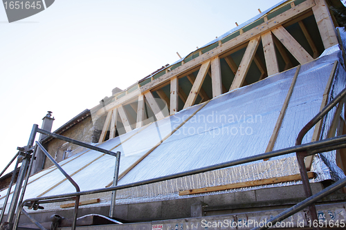 Image of construction of the wooden frame of a roof