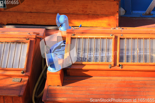 Image of details of an old fishing boat sailing out of wood