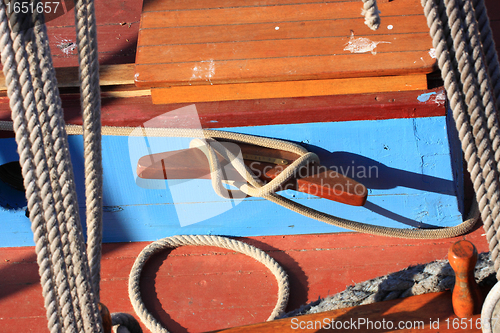 Image of details of an old fishing boat sailing out of wood