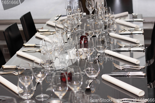 Image of glasses, cutlery on the table a great restaurant