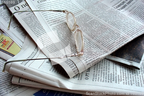 Image of Newspaper and the glasses