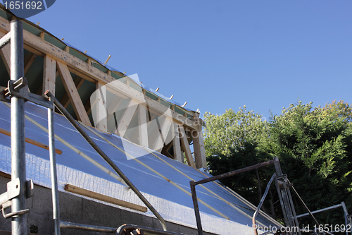 Image of construction of the wooden frame of a roof