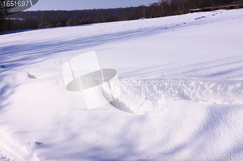 Image of snowy landscape in the winter sun in France