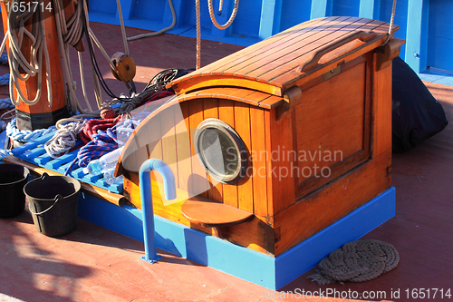 Image of details of an old fishing boat sailing out of wood