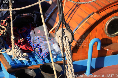 Image of details of an old fishing boat sailing out of wood