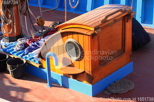 Image of details of an old fishing boat sailing out of wood