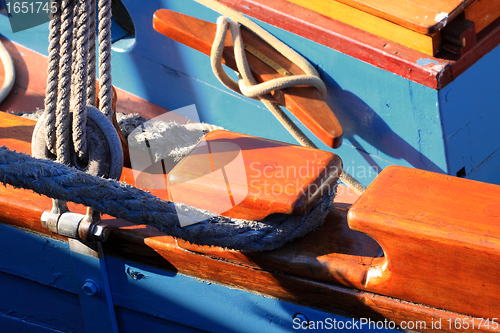 Image of details of an old fishing boat sailing out of wood