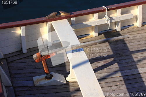 Image of details of an old fishing boat sailing out of wood