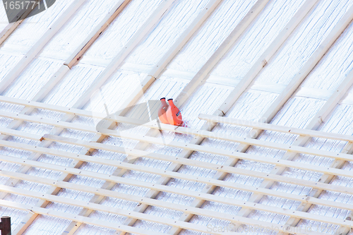 Image of construction of the wooden frame of a roof