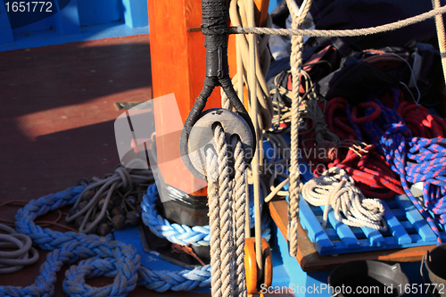 Image of details of an old fishing boat sailing out of wood