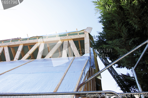 Image of construction of the wooden frame of a roof