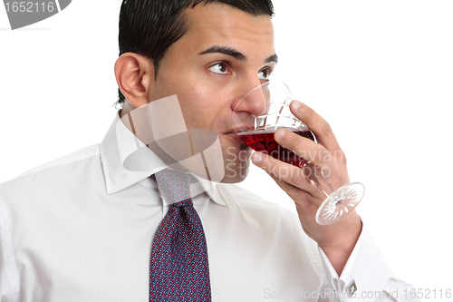 Image of Man drinking or wine tasting