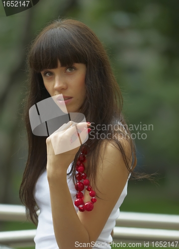 Image of Girl with red beads