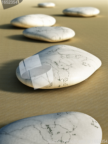 Image of stones in the sand