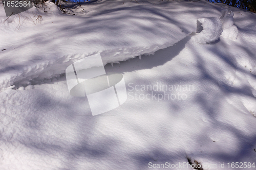 Image of snowy landscape in the winter sun in France