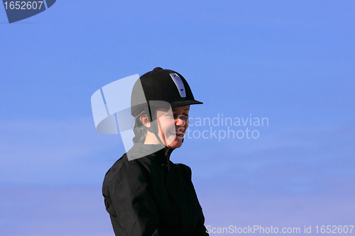 Image of portrait of a young rider before a contest