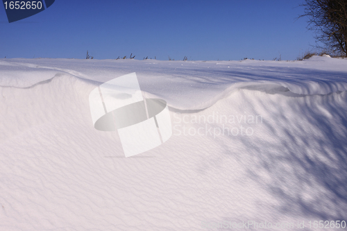 Image of snowy landscape in the winter sun in France