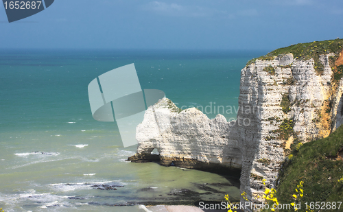 Image of Beach with cliff Falaise d'Aval. Normandy, Cote d'Albatre, France. 