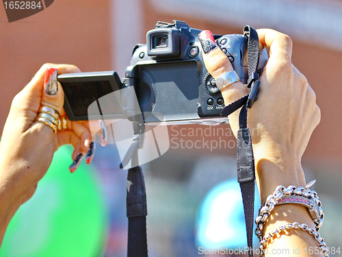 Image of  Camera in women's hands