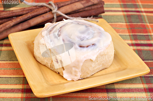 Image of Cinnamon Bun and cinnamon sticks