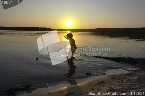 Image of boy and sunset