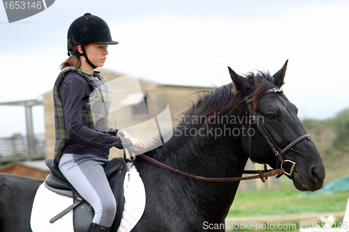 Image of horse and woman in dressage