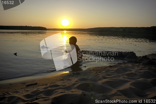 Image of boy and sunset