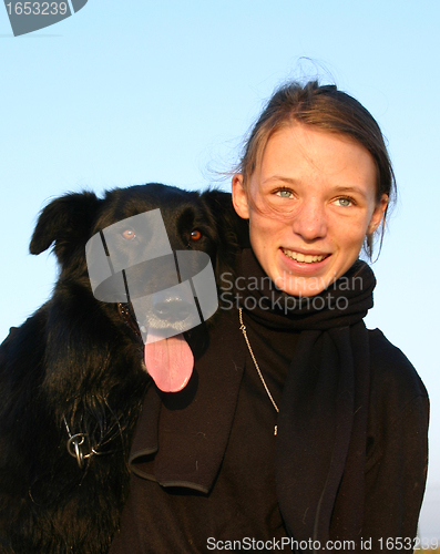 Image of teen and belgian shepherd