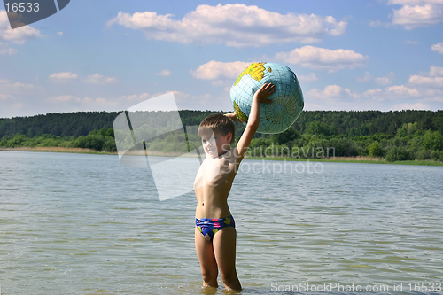 Image of our world in the child's hand