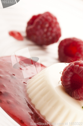 Image of Vanilla panna cotta with berry sauce