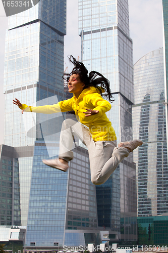 Image of girl in a tracksuit jumping