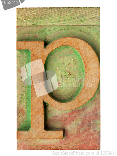 Image of letter p in letterpress wood type