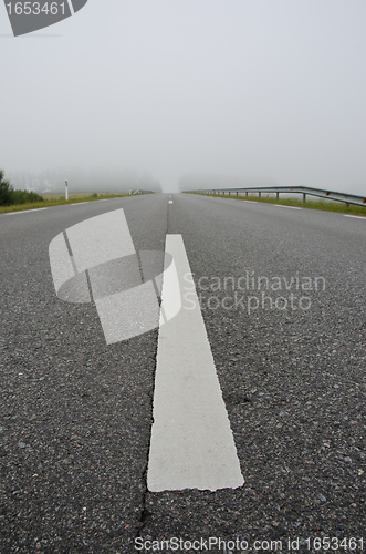 Image of Background of asphalt road mark early morning fog 