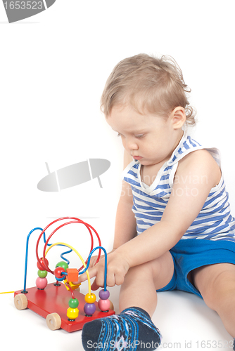 Image of boy with a toy