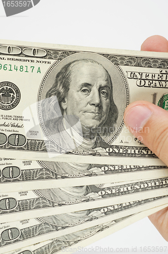 Image of Hand with dollars