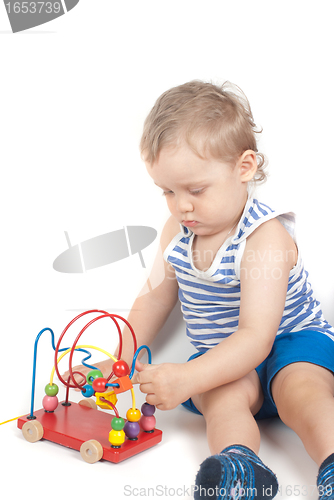 Image of boy with a toy