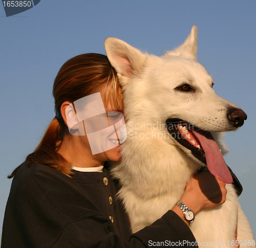 Image of Swiss shepherd and woman