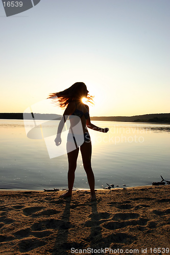 Image of girl and sunset
