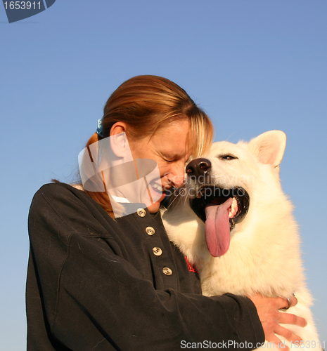 Image of Swiss shepherd and woman