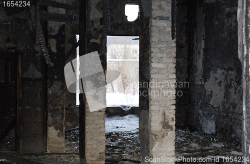 Image of the remains of a ruined house in a terrible form of