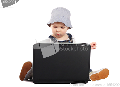 Image of Little boy with a laptop